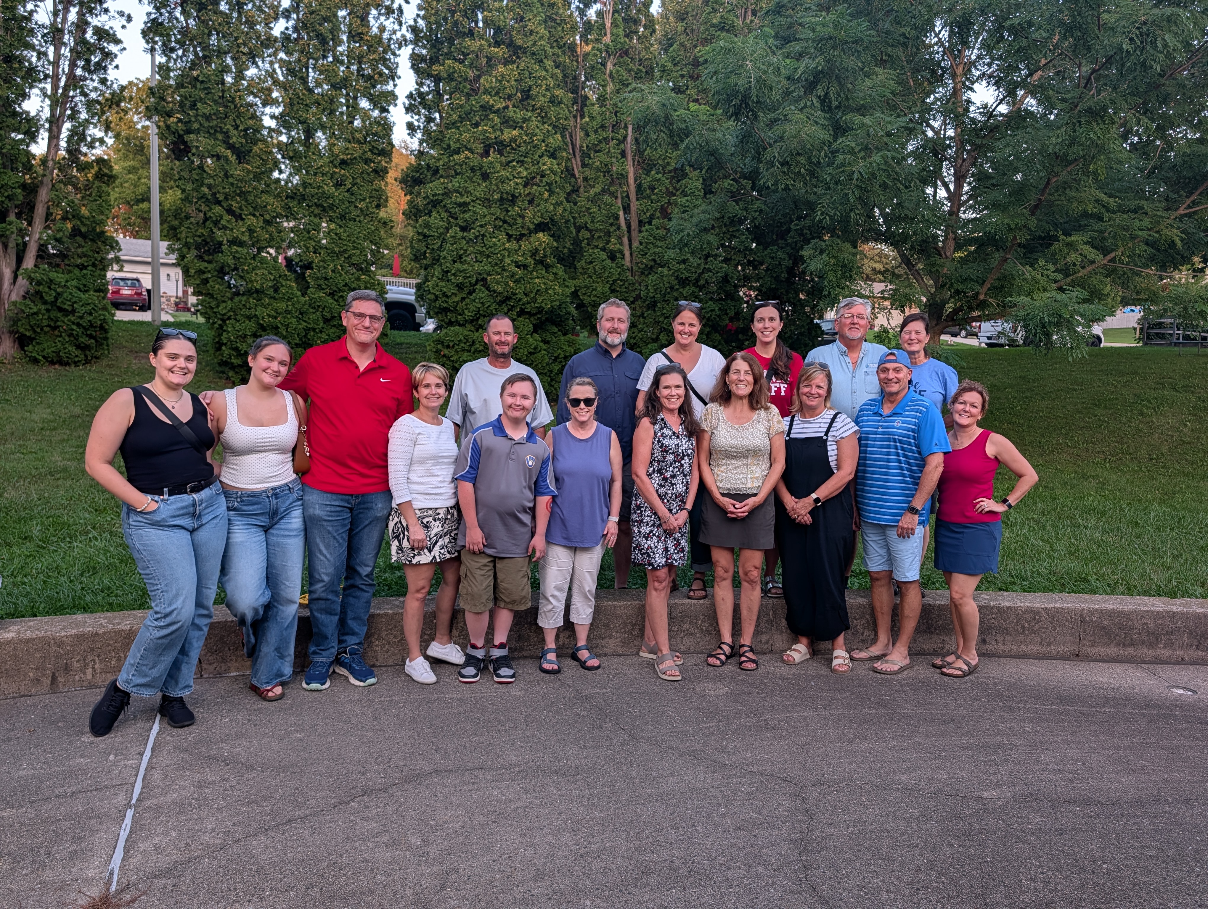 Optimist Club members and their families gathered for a group photo at the family picnic in Grundahl Park