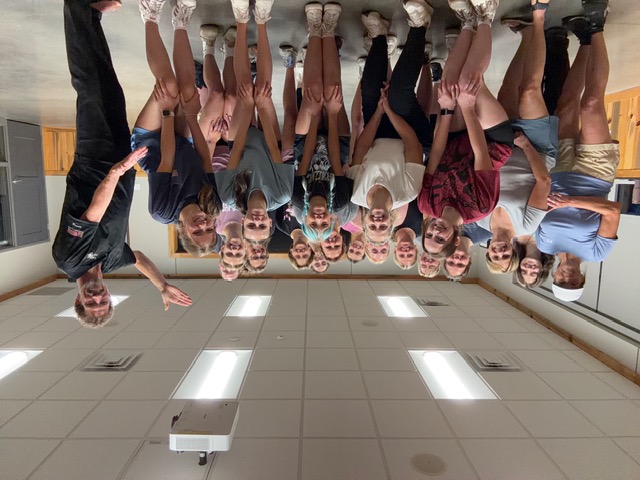 The women who turned out for the workshop, gathered for a group photo with instructor Brandon Tracy