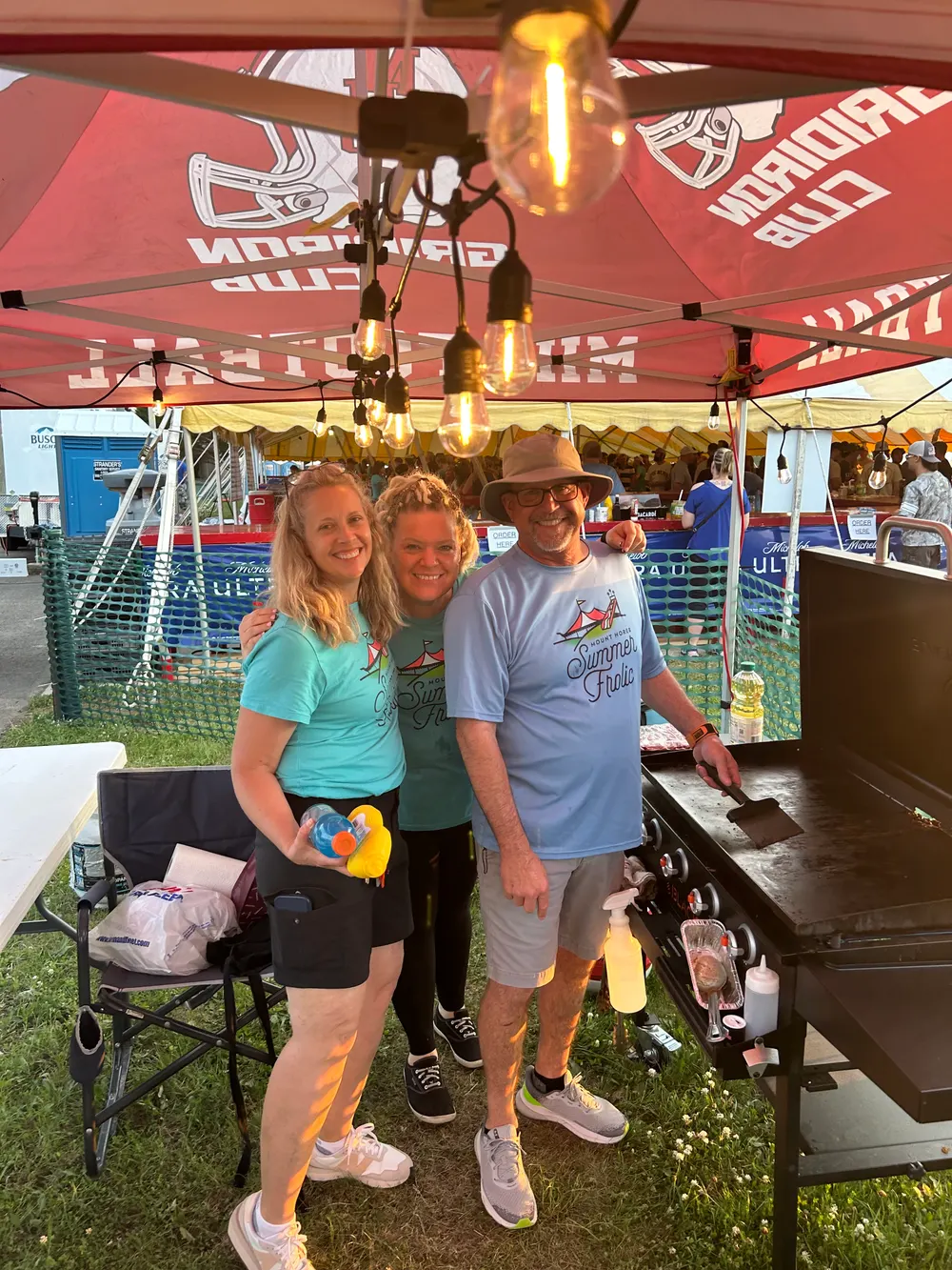 Optimist Club members grilling at the Frolic