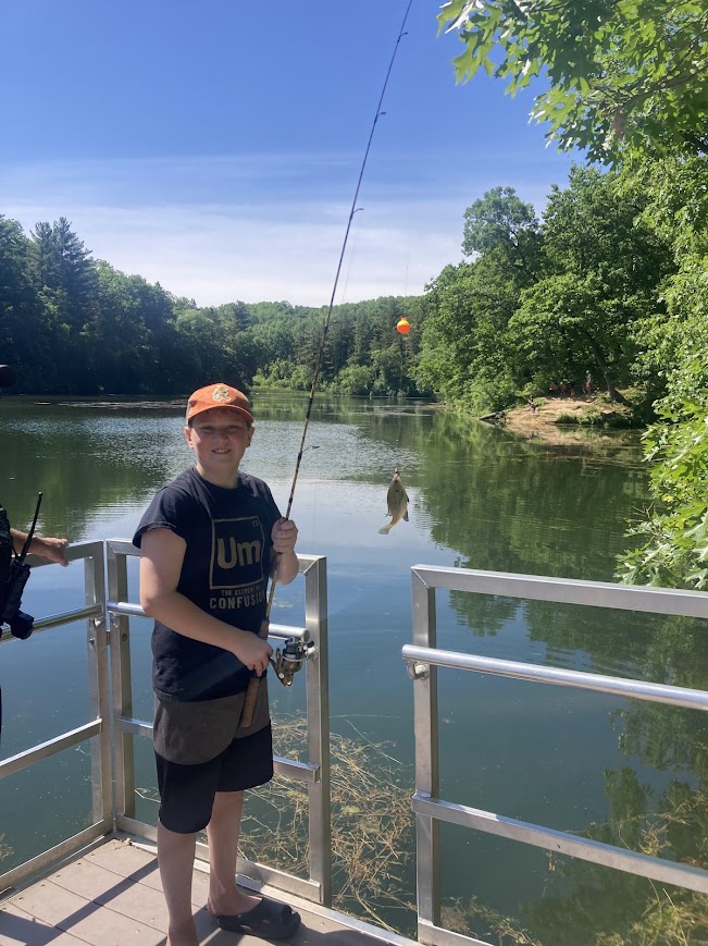 A kid fishing at Cops and Bobbers